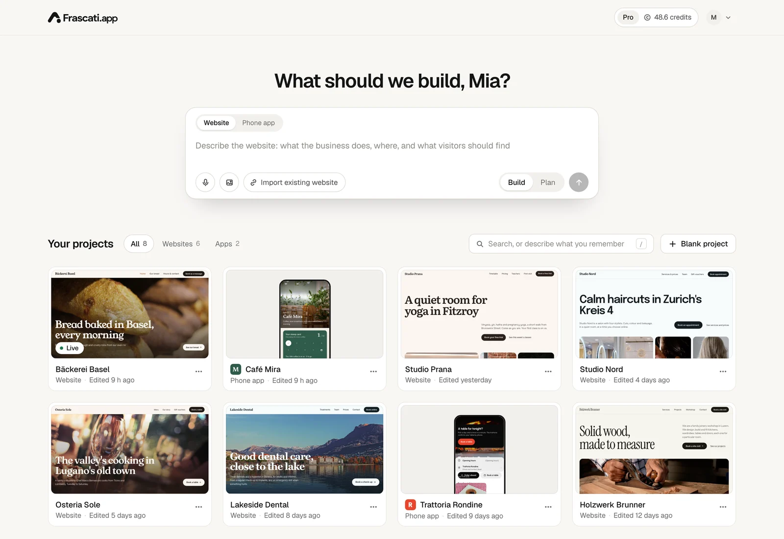 The dashboard: the box with Website and Phone app, and below it eight projects as cards with a picture of each, the bakery marked Live, with All, Websites and Apps, the search and Blank project above them